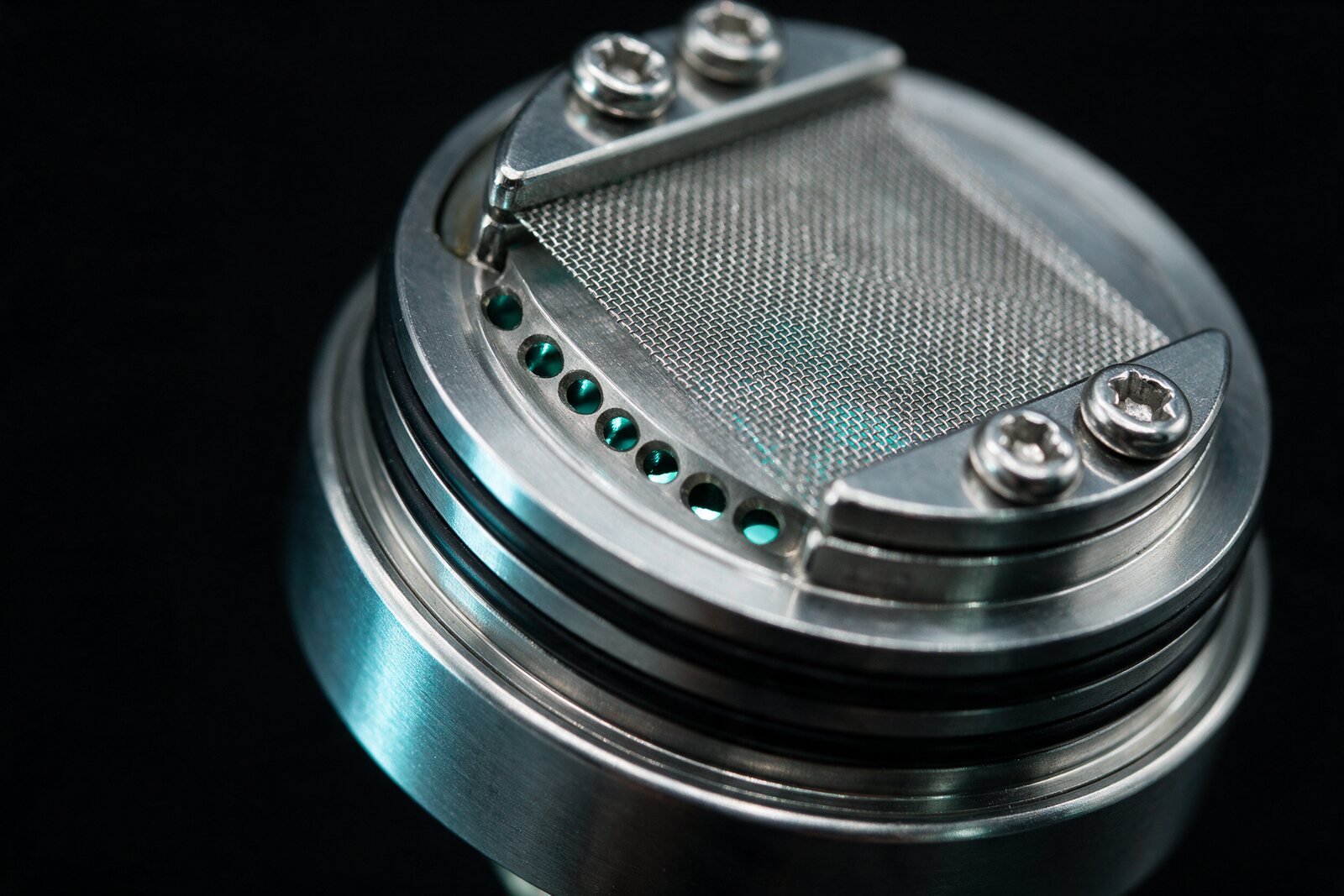 Macro of the RDA showing the ring of intake holes beneath the mesh screen